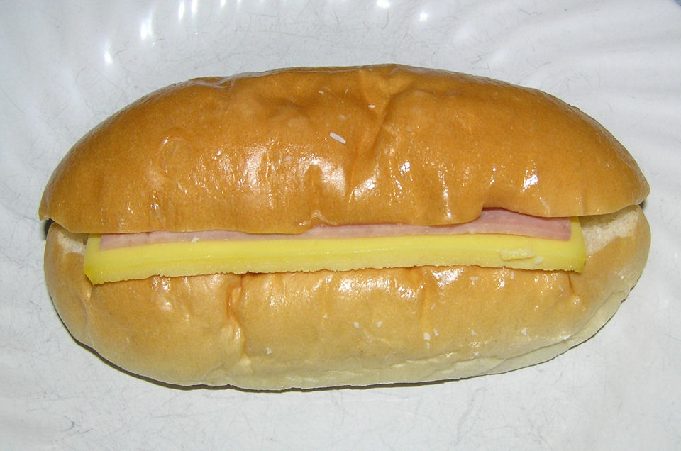 A photograph of ham and egg bun